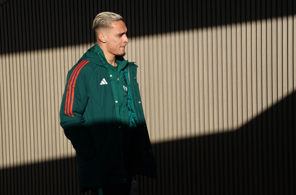 manchester united's antony stands in shadow ahead of their game with luton town at kenilworth road
