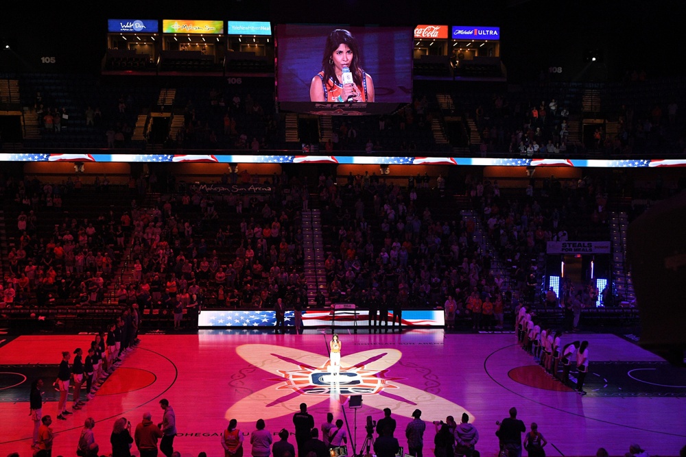 August 31, 2023: Players and coaches on the Connecticut Sun (left) and Phoenix Mercury (right) stand for the singing of the national anthem before a WNBA game between the Phoenix Mercury and the Connecticut Sun at Mohegan Sun Arena in Uncasville, Connecticut. Erica Denhoff/CSM - Image ID: 2RNPA7F