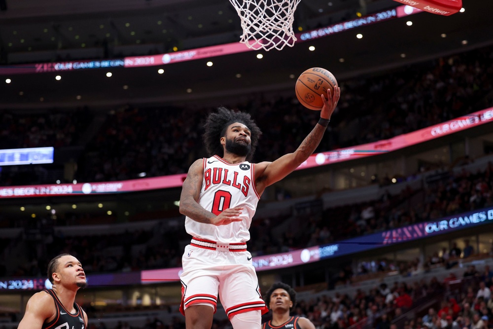 Bulls guard Coby White goes up for a basket during the fourth quarter against the Pistons at the United Center in Chicago on Nov. 12, 2023. (Armando L. Sanchez/Chicago Tribune/TNS) - Image ID: 2T957F1