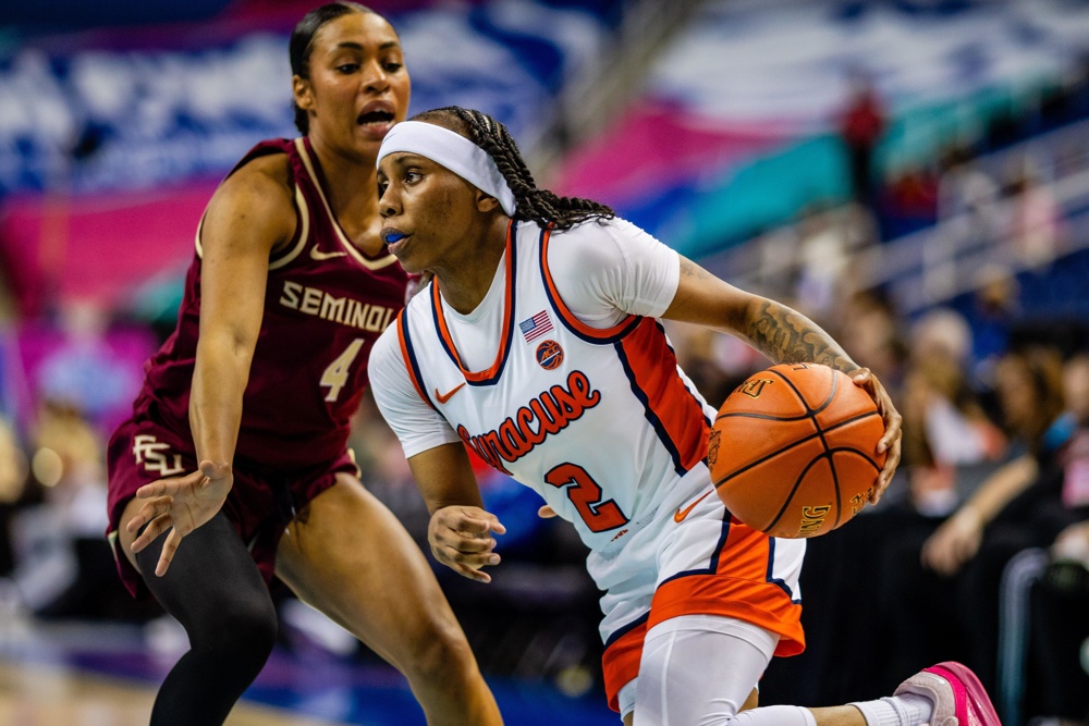 Greensboro, NC, USA. 8th Mar, 2024. Syracuse Orange guard Dyaisha Fair (2) drives past Florida State Seminoles guard Sara Bejedi (4) during the quarterfinals of the Women's ACC Tournament at Greensboro Coliseum in Greensboro, NC. (Scott Kinser/Cal Sport Media) (Credit Image: © Scott Kinser/Cal Sport Media). Credit: csm/Alamy Live News - Image ID: 2WPR2C7
