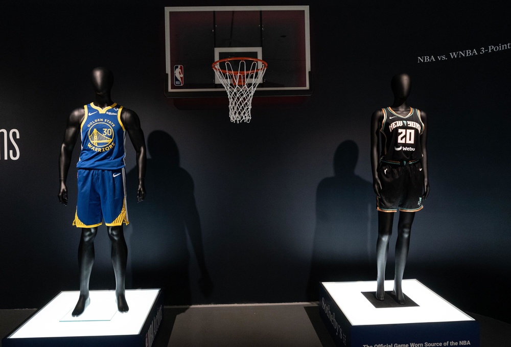 New York, US, 04/04/2024, Stephen Curry and Sabrina Ionescu complete uniform worn during NBA vs. WNBA 3-point challenge at 2024 All-Star on display during press preview for the Sotheby's auctions of sport memorabilia in New York. Auctions will take place online and live in person on April 11, 2024. Some highlights include Muhammad Ali worn trunk from The 'Thrilla in Manila', Kobe Bryant worn jersey from 2009 NBA Finals, Michael Jordan Air Jordan 11s from 1996 NBA Finals, as well as memorabilia from NBA All-Star 2024 and collection of sneakers worn by NBA greatest players. (Photo by Lev Radin/P - Image ID: 2WY97KE