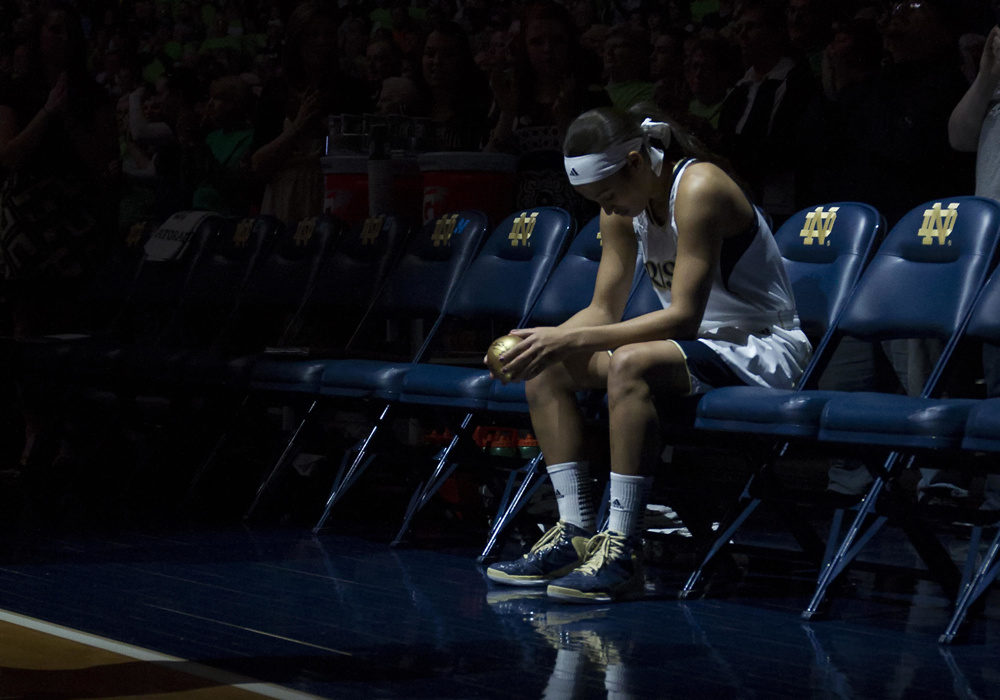 South Bend, Indiana, US. 4th March, 2013. Notre Dame guard Skylar Diggins (4) waits for her name to be called before her final home game prior to NCAA Basketball game action between the Notre Dame Fighting Irish and the Connecticut Huskies at Purcell Pavilion at the Joyce Center in South Bend, Indiana. Notre Dame defeated Connecticut 96-87 in triple overtime. - Image ID: D45J38